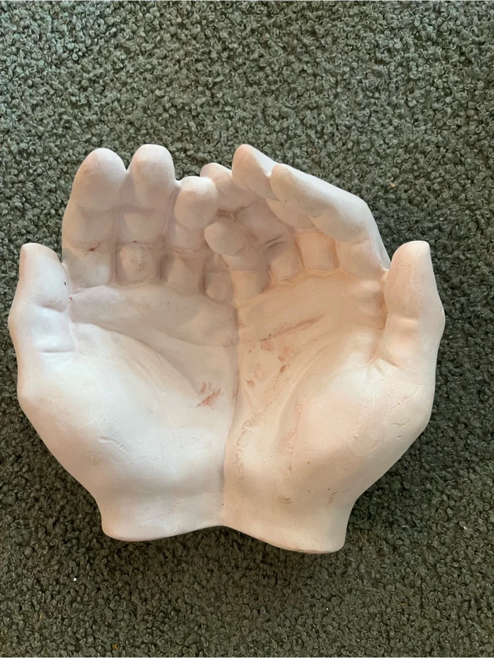 Giving Hands made of plaster of Paris and colored with white